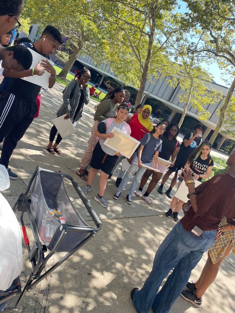 Students filming a documentary